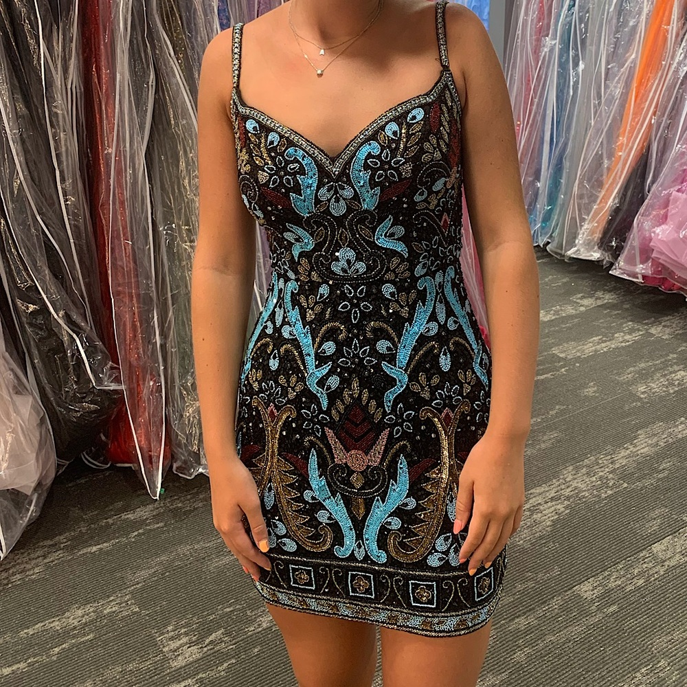 Beautiful homecoming dress that has a pop of every color!!!